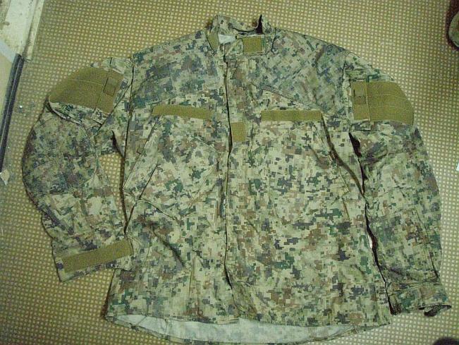 Combat Jacket: CUSTOM COMBAT UNIFORMS AND CAMOFLAGE DESIGNS Fig 1 The Combat Jacket (Fig 1) is similar in design to the ACU (army combat