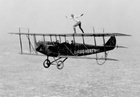 Most of the first pilots made their living by barnstorming. Barnstorming is another word for performing aerial stunts and parachute jumping.
