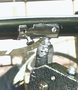 Position the supplied upper pin on the rear canopy
