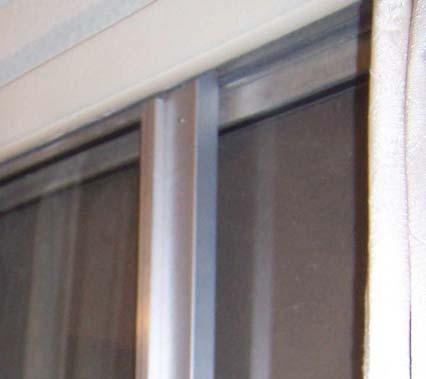 The closer is held to the side of the door with a roll pin at the top and a single screw at