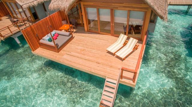 waters. The sea-facing wall opens out onto your own wooden veranda with a private dining area, daybed, sun loungers and steps leading directly into the clear waters of the Indian Ocean.