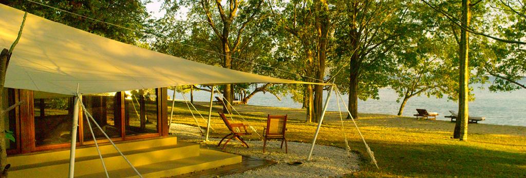 The camp s 20 luxury tents are located under a forest canopy and are a haven for divers, hikers and nature lovers.