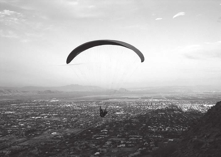 24 60 hikes within 60 miles: Phoenix A parachuter takes off on a sunset ride from the Cholla Trail on Camelback Mountain. and you ll see the McDowell Mountains to the northeast.