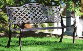CAST IRON BENCH A throwback to turn-of-the-century styles, this bench has all the charm and grace of