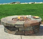 CLEARWATER GAS FIRE TABLE A 20-lb., 50,000 BTU propane tank and stainless steel burner power this unique faux stone fire pit.