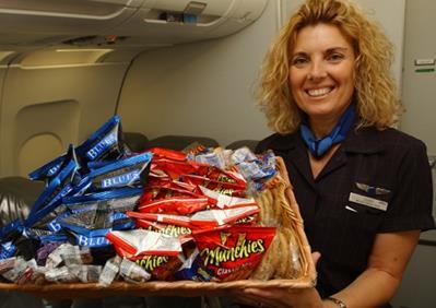 During the flight, the flight attendants will come around with drinks, and