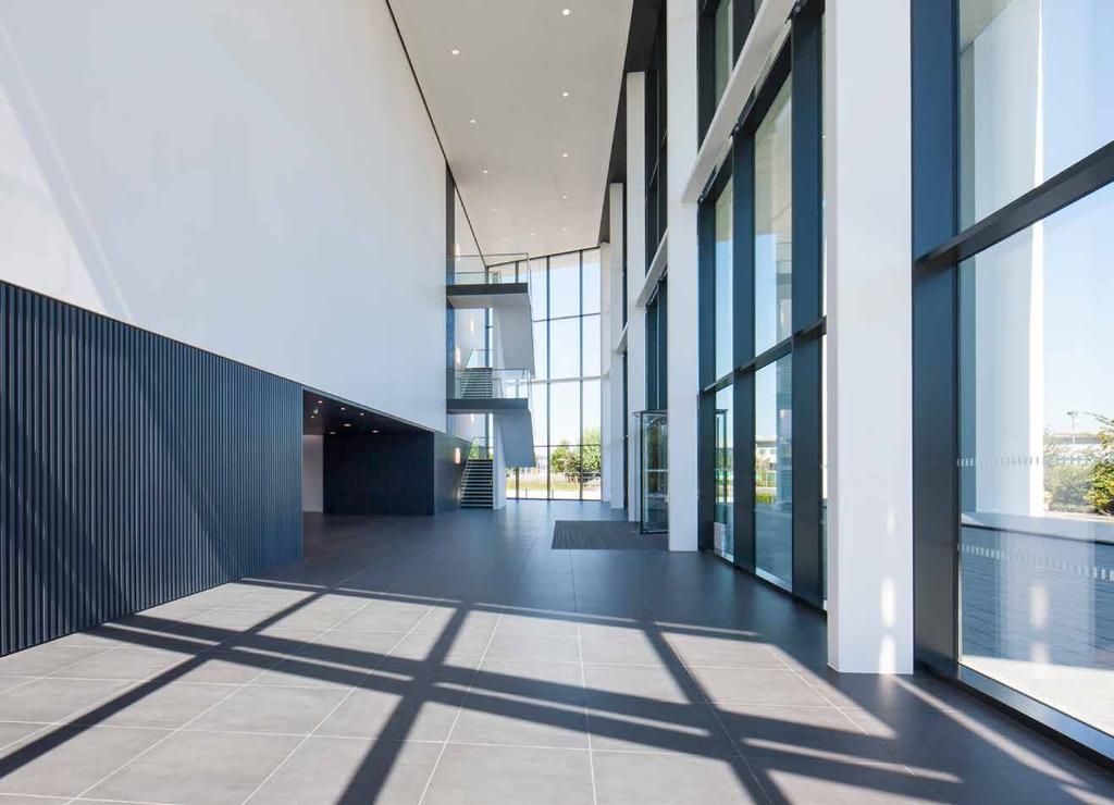 STATEMENT RECEPTION THE BUILDING S TRIPLE HEIGHT ENTRANCE HALL CREATES A MEMORABLE IMPRESSION OF SPACE.