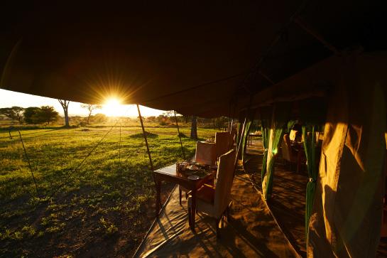 Each of the spacious tents feature an en-suite bathroom and private veranda overlooking the Moru Kopjes in the prime wildlife areas of central and southern Serengeti; Dunia