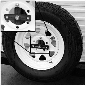 SECTION 4 TOWING & HANDLING JAYCO TOWABLE To extend the tire down 1. Remove the cotter key from the pin holding the tire carrier in place. 2.
