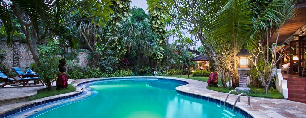 WELCOME TO ----------at LEGIAN BALI---------- A centrally located two-story solid brick, three bedroom villa set on a 1,000 m2 block of land with around 150 m2 of living space.