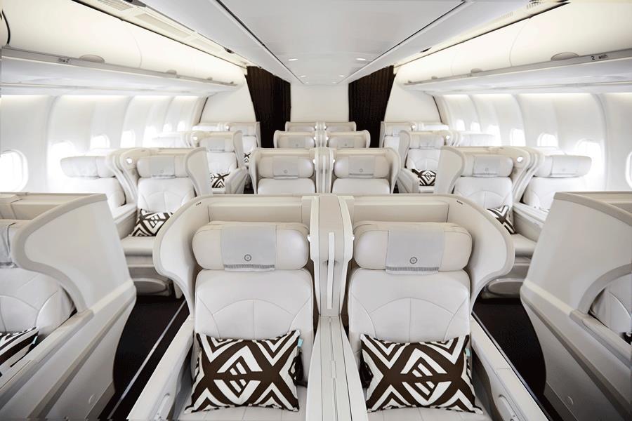 Features of Business Class on flights to Fiji: Angled lie-flat beds with (8 degrees inclined from horizontal) with customised controls 76 of bed length, and an integrated privacy divider between