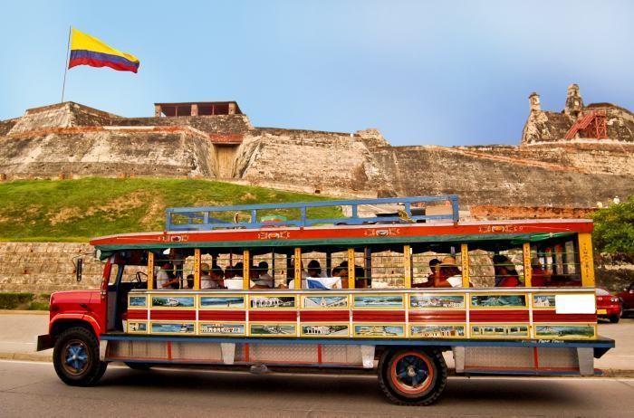 Tours Historic City Tour. Tour to know the history that contains the Corralito de Piedra in a typical Colombian Chiva.