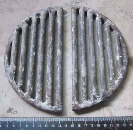 In order to try to burn most of the charcoal produced by the fire, a grate was fashioned from round mild steel bars and cut into two D shaped sections.