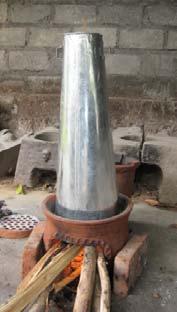This reduces the emission of smoke into the face of the cook a reasonable and welcome change. 3.4. Use of a lighting cone The slots may not be wide enough or the top not round enough.