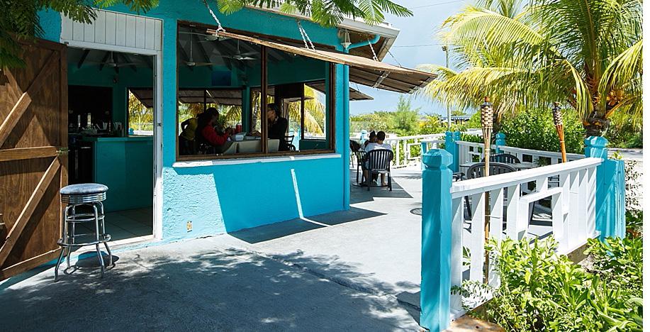 The restaurant is known for its fresh conch dishes and sublime location at the edge of the turquoise sea. Mr.