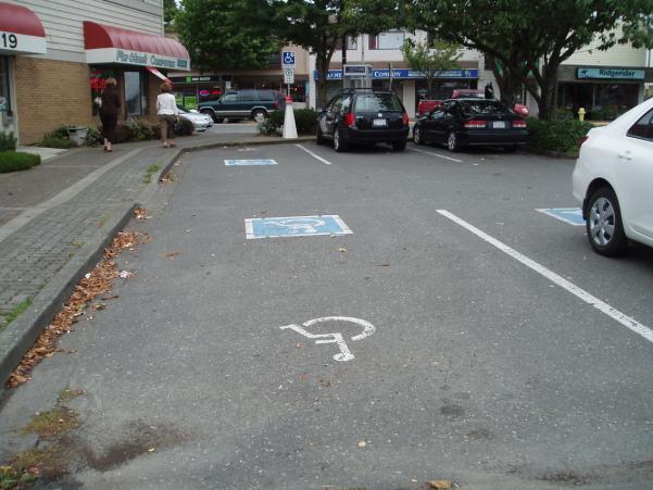 Disabled Parking Spaces Principles Disabled parking spaces shall ensure parking spaces are as close to building or destination as possible ensure safety and protection from roadway or vehicular
