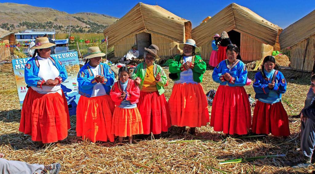 LAKE TITICACA Lake Titicaca, the largest lake in South America, lies on the border between Peru and Bolivia. At 3,812 m (12,507 ft.) above sea level is the highest navigable lake in the world.