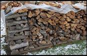 Energy auditors Check Firewood! Inspect fuel storage to see if wood is split, stacked and covered. Splitting and stacking is essential; covering is best.