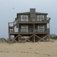home is oceanfront, with uninterrupted views of the beach and ocean with an