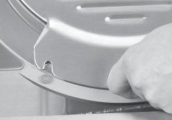 Carefully insert the cloth between the knife and the knife ring guard (Fig. 14-1). While holding the cloth between the knife and the knife ring guard, work it along the entire backside of the knife.