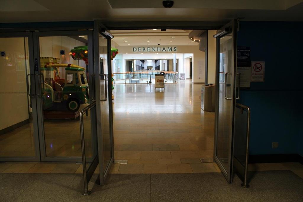 Entrance to Ocean Terminal, 2 nd floor. On entry to the Shopping Centre from Level E, the entrance to our Visitor Centre is approximately 40 metres away. The centre is tiled throughout.