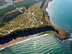 See the Pointe du Hoc Ranger Memorial, commemorating the heroic raid of the American Second Ranger Battalion and the forces involved in the Normandy landings.