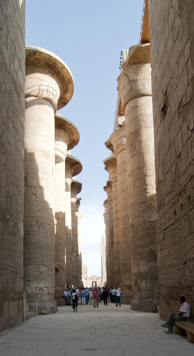 The columns have bud-cluster or bell-shaped capitals resembling lotus or papyrus, the