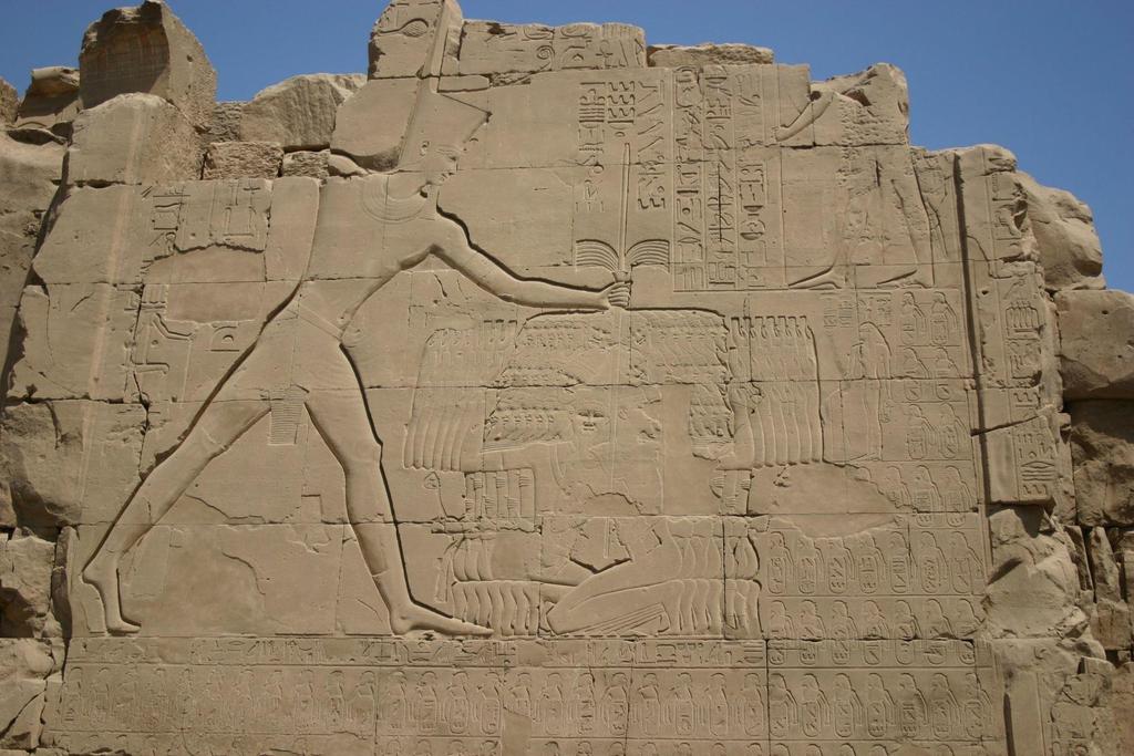 Thutmose III smiting Caanite enemies on the seventh pylon