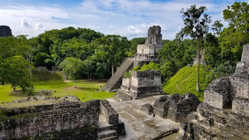 Tikal Mayan ruins: While it s not technically in Belize, another popular day trip is to the ruins found in Tikal, Guatemala plus, it s an easy way to get another passport stamp!