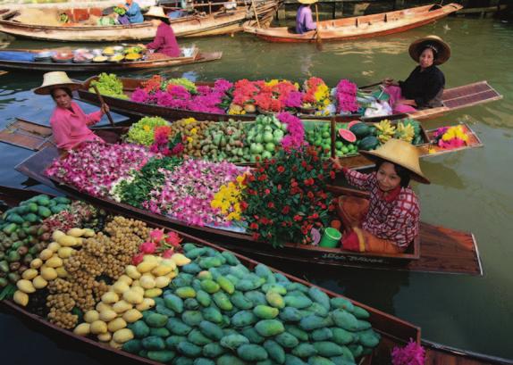 10 Merchants sell flowers and fruit from flat boats in Bangkok. The city of Bangkok, Thailand (TIE-land), has a virtual maze of canals flowing through it.