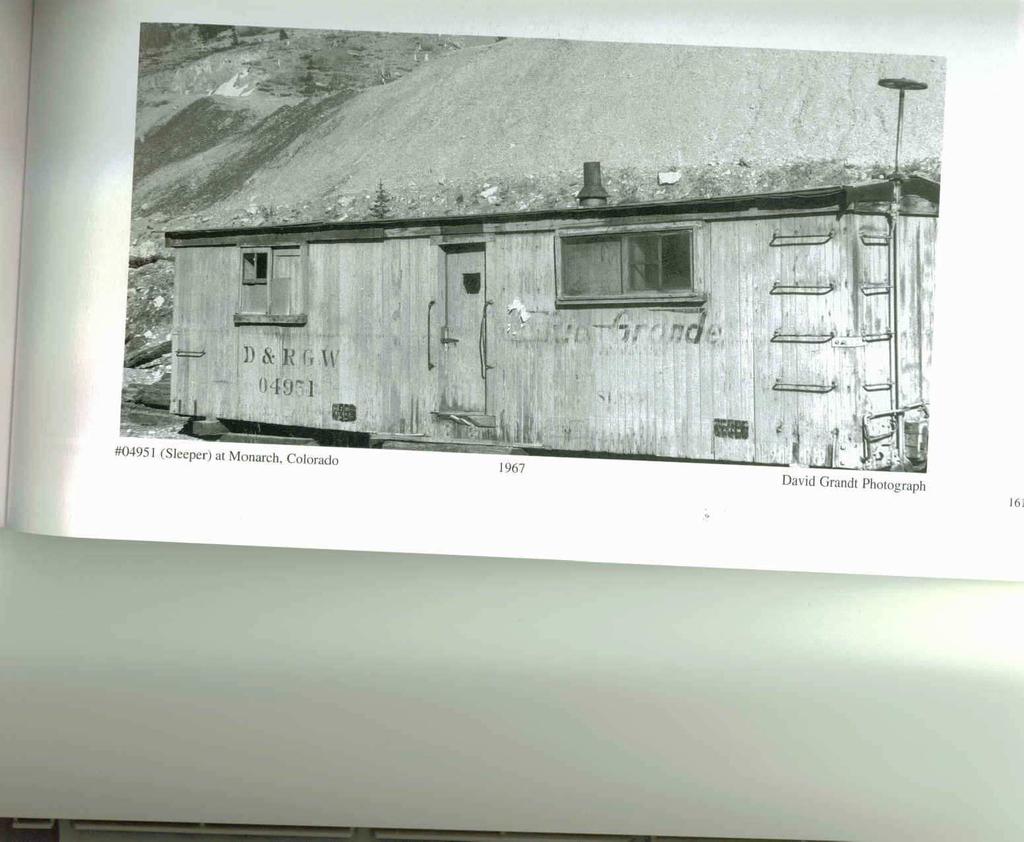 By the time this picture was taken in 1967, our bunk car had been reduced to little more then a shortage shed sitting on the ground at Monarch, Colorado.