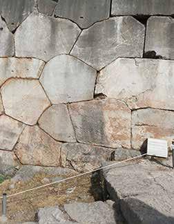 This ancient wall is next to the Temple of Apollo. Most ancient walls were made of blocks of stone, but the blocks of this wall are not rectangular.
