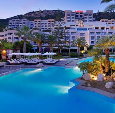 Suggested Hotels in Rhodes Lindian Village 5***** The luxurious Lindian Village is located right on the breathtaking Lardos Beach, nestled in a lush garden with tropical flowers and trees.