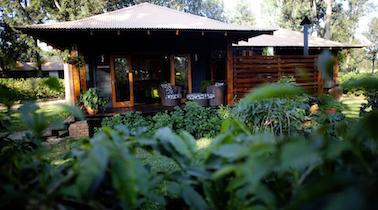 Arusha Coffee Lodge The lodge, set in picturesque gardens, is surrounded by some of Africa s most beautiful landscapes and holds central place at the foot of Mount Meru.