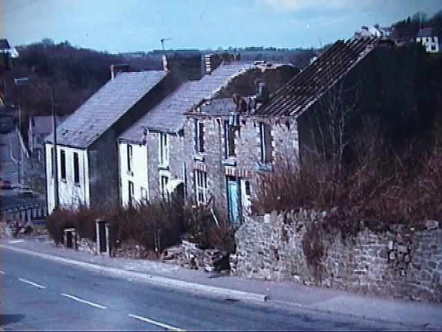 The beginning of the removal of Post Office Row 1984 Opposite the entrance to Howells Row on the corner of Highland Terrace was Johnny Jones shop with its bakery behind.