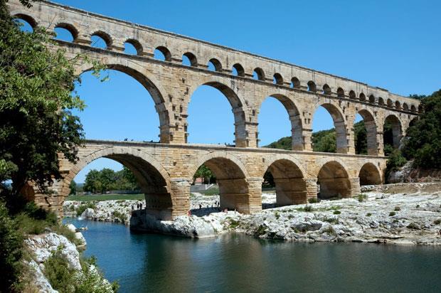 An aqueduct is a system of bridges and canals used to carry