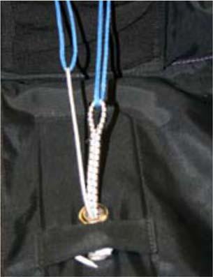 Pass a pull-up cord through the reserve closing loop and a second pull-up cord through the shock cord staging loop as shown. NOTE: The pre-stretched reserve closing loop will measure 4 ½ +/- ½.