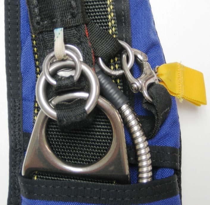 6. Ensure the stiffened part of the RSL lanyard is completely inserted into the