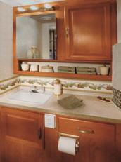 TIOGA SL S ROOMY BATHROOM features a large vanity and plenty of storage space for toiletries.