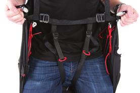 To put the harness on first place the shoulder straps over your