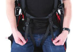 reclined position in the air. The shoulder strap retainer clip should now be fastened.