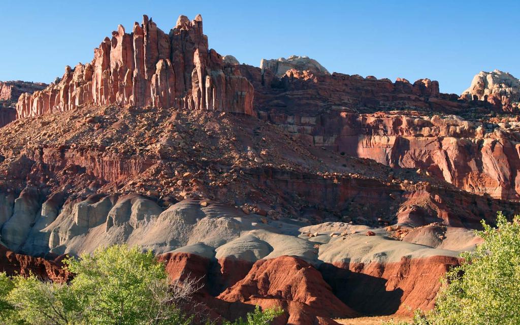 Capitol Reef National Park Explore Spend day two basking in the south-central desert oasis of Capitol Reef s shimmering sandstone cliffs, soaring monoliths, and otherworldly domes.