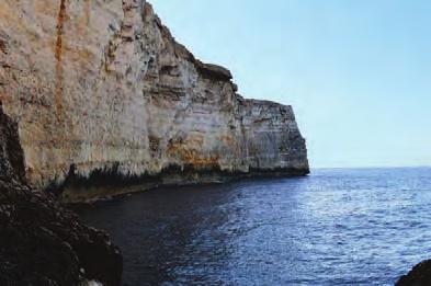 OPTION TO MIĠRA L-FERĦA The detour to Miġra l-ferħa provides a rare opportunity to explore the lower level of coastal cliffs and their wild shoreline.