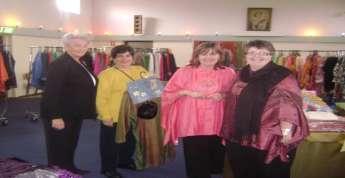 Fashion Sale Raises Plenty Irene L, Maria K, Anne R and Judi A checking out the finery at the Fashion Sales Extravaganza.