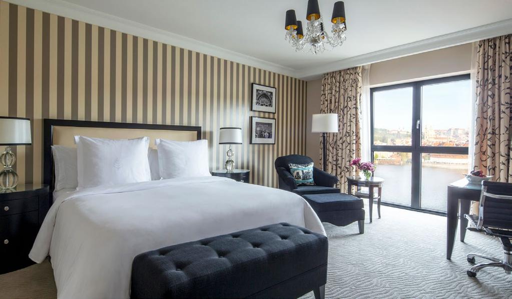 ECLECTIC ELEGANCE Unwind in lavish Four Seasons guest rooms among the largest in Prague.