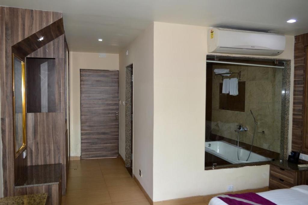equipped bathrooms, well comfort bed, sets of chairs set of chairs with centre Table, a wardrobe,
