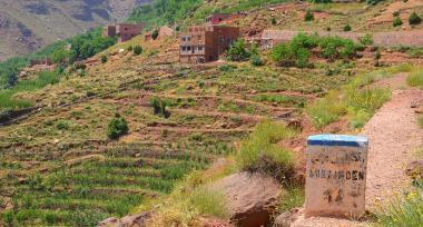 The steep climb to the High Atlas passes many small farms and villages.
