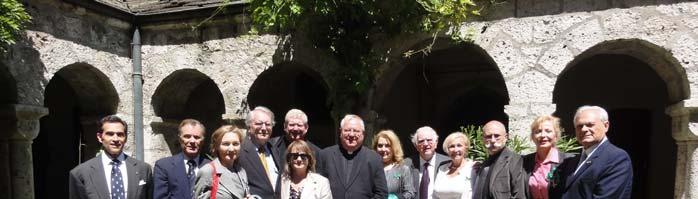 The American Delegation in a medieval courtyard of the