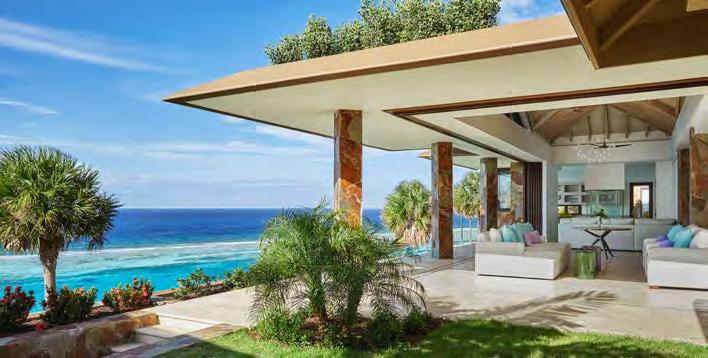 stunning views of the reef below. Floor-to-ceiling glass doors completely retract in the Great Room in addition to ample living space, fireplace and gourmet kitchen.