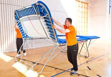 Figure 11 Should the trampoline have standard roller stands, take the weight of the trampoline at one end ensure that